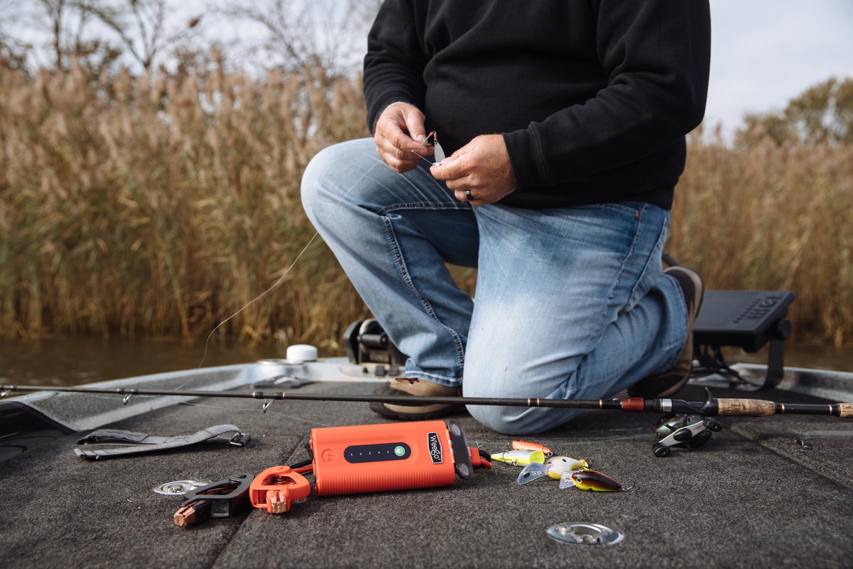 Portable battery in use by a bassmaster
