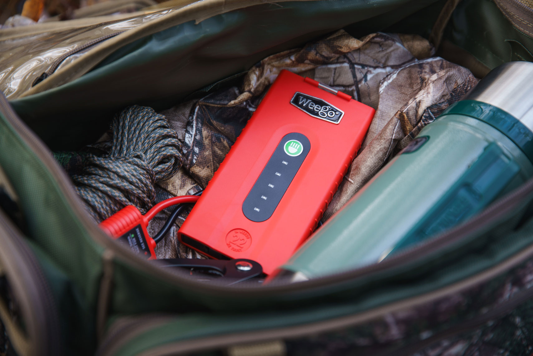Portable battery among hunter gear