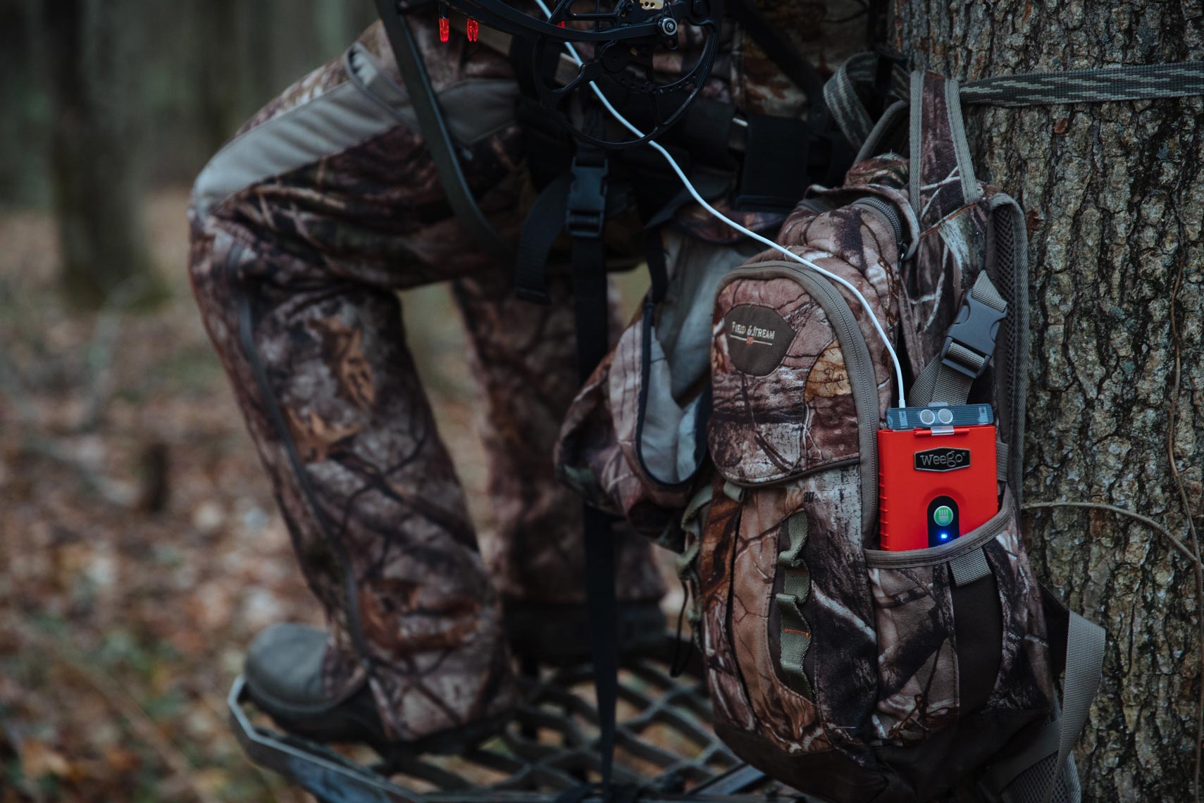 Portable battery in use by a hunter
